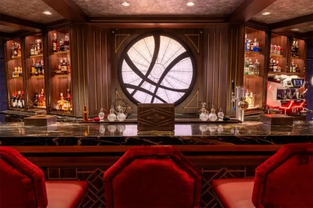 The window over the bar in the Disney Destiny's Sanctum lounge