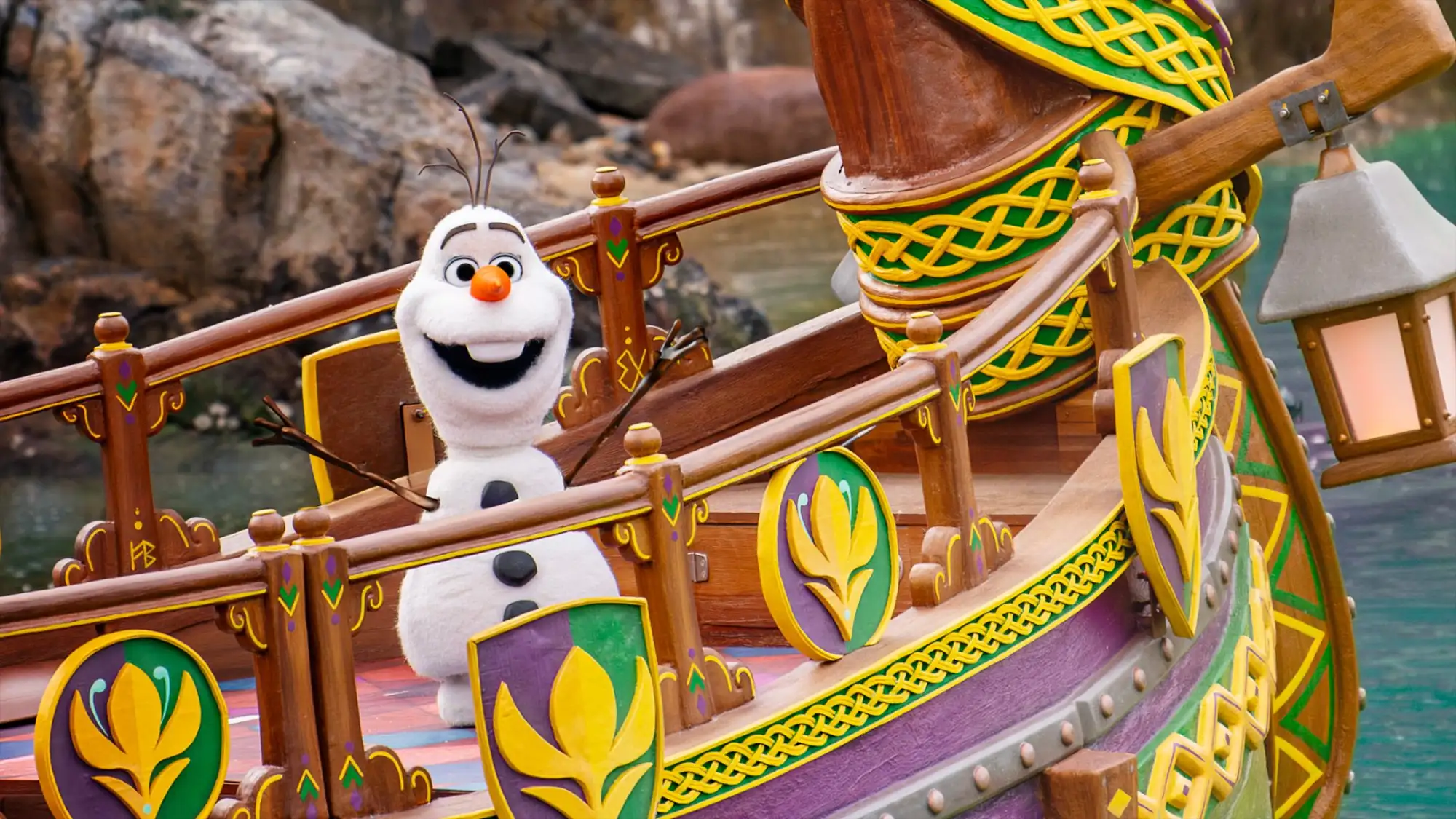 Olaf on a boat in the Celebration in Arendelle show at Disney Adventure World