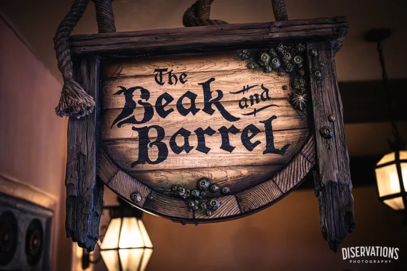 The Beak and Barrel sign featured distressed wood and barnacles