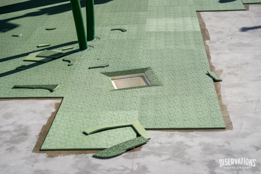A partially installed floor at Shrek's Swamp Splash & Smash